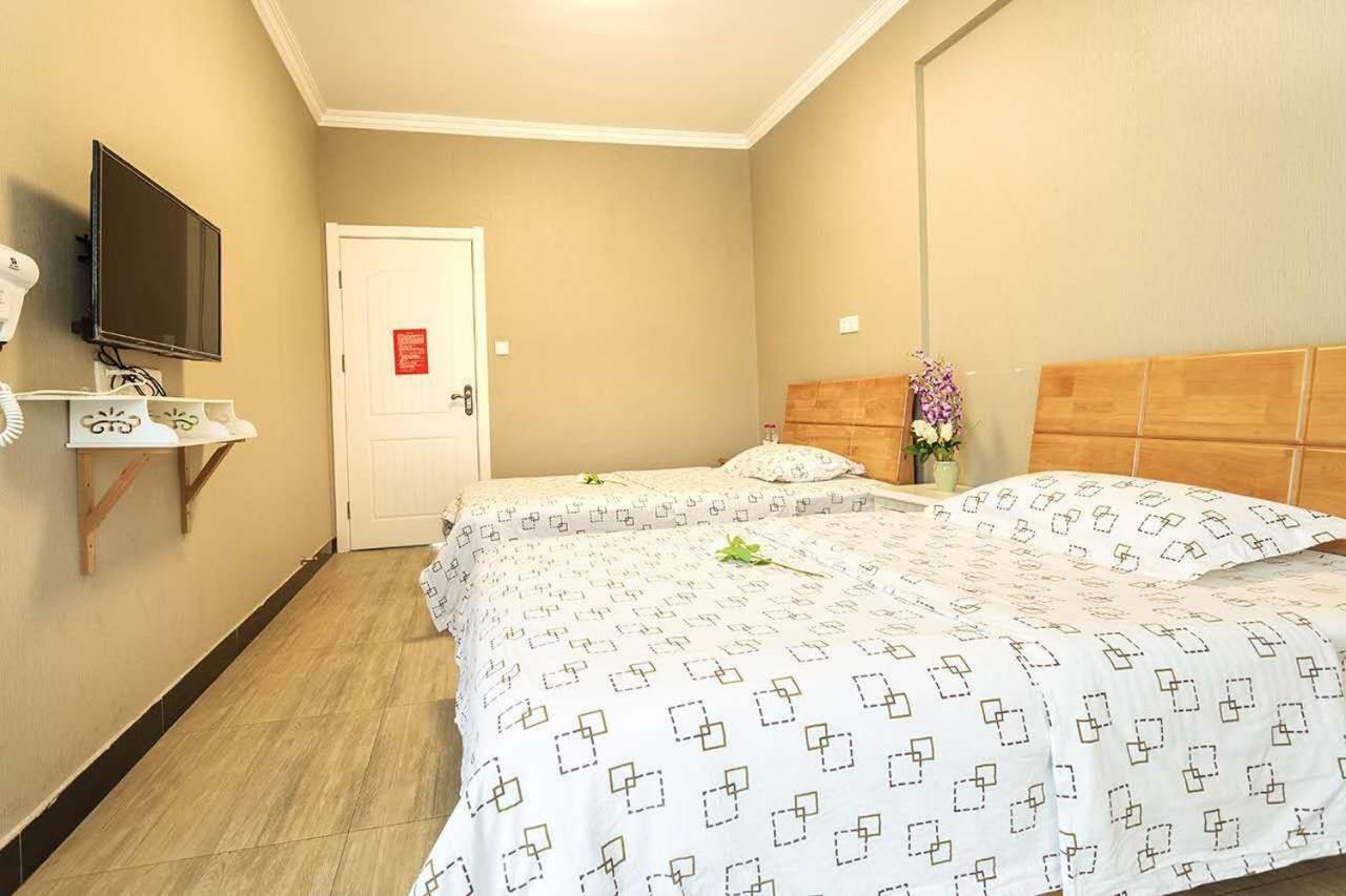 Huanlesong Youth Hostel ووهان المظهر الخارجي الصورة